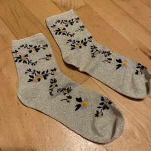 Brugte blomstrede glimmer sokker